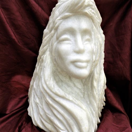 Ino, la déesse marine vue par l'artiste. Un coquillage est sculpté sur sa tête.